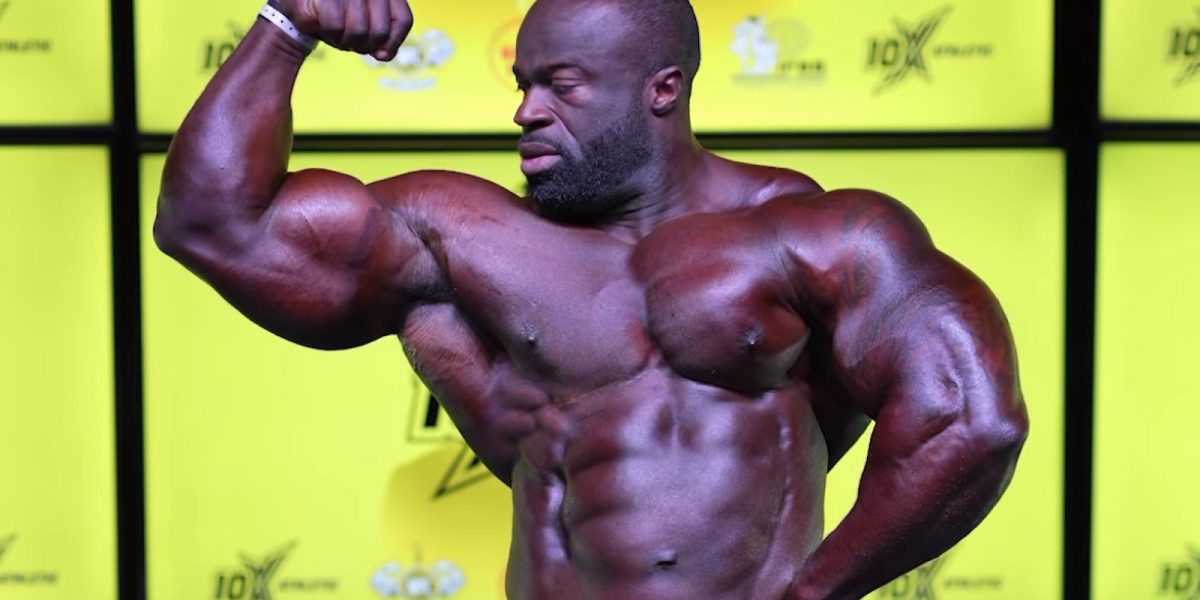 samson-dauda-resembles-a-massive-titan-while-guest-posing-at-10x-ben-weider-2023